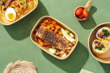 Za’atar grilled salmon with turmeric sweet potatoes & Mediterranean salad